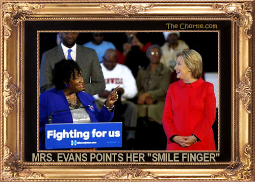 Mrs. Evans points her "smile finger"